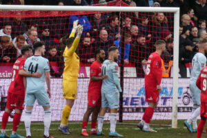 Harriers defend a corner against West Ham